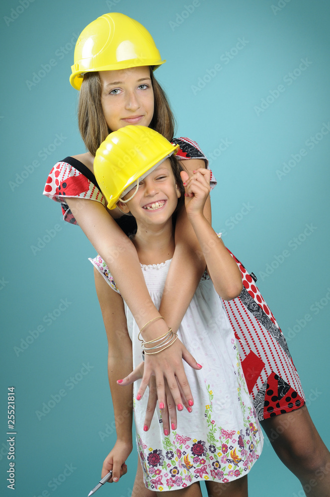 happy children presenting constructions equipments happy children presenting constructions equipments