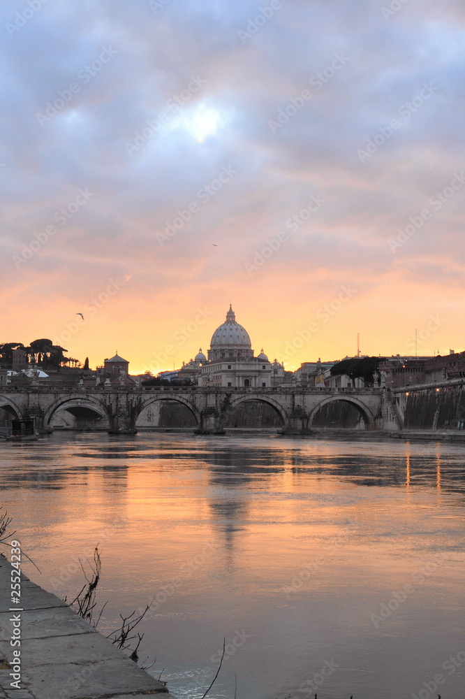 Obraz premium view of Vatican reflected on Tiber river in Rome at sunset