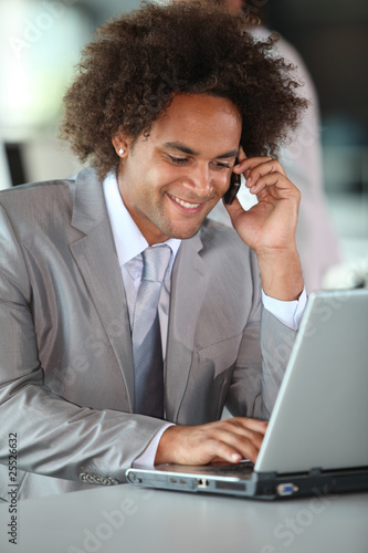 Closeup of happy businessman in the office photo