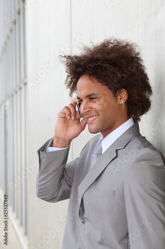 Portrait of a businessman in telephone interview