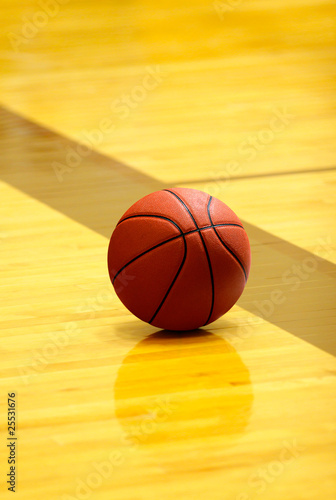 Basket ball on court