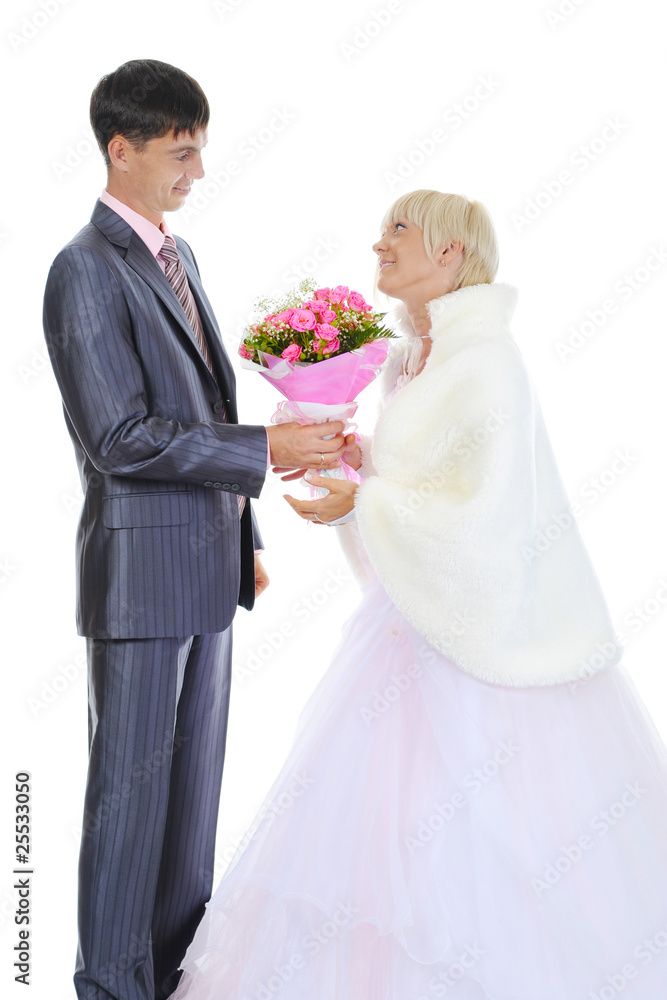 groom gives the bride a bouquet of roses groom gives the bride a bouquet of roses