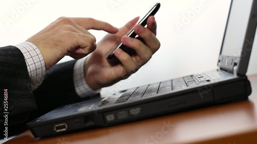 Shopping online using cell phone and laptop