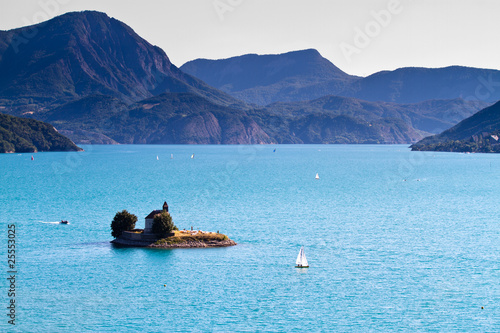 serre poncon chapel in lake