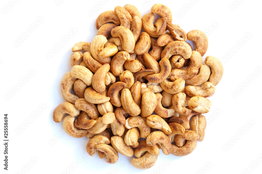 Cooked, roasted cashew nut on isolate background. Cooked, roasted cashew nut on isolate background.