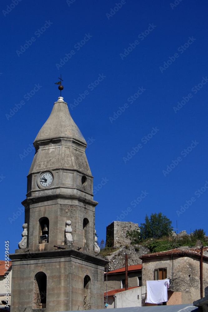 Southern Italy-Campanile in borgo medievale con orologio