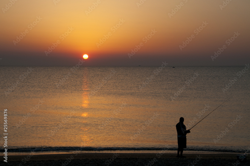 pescatore al tramonto