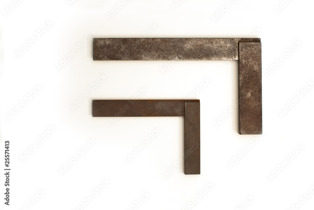 Old and rusty carpenters squares Old and rusty carpenters squares