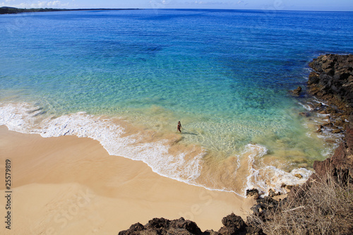 young woman at makena beach in maui, hawaii