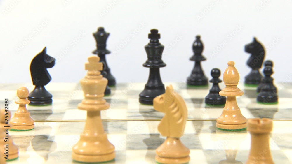 Chess board with chess pieces dolly back shot Chess board with chess pieces dolly back shot