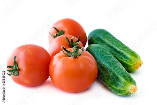 red tomatoes and green cucumbers