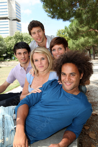 Group of happy students in a park