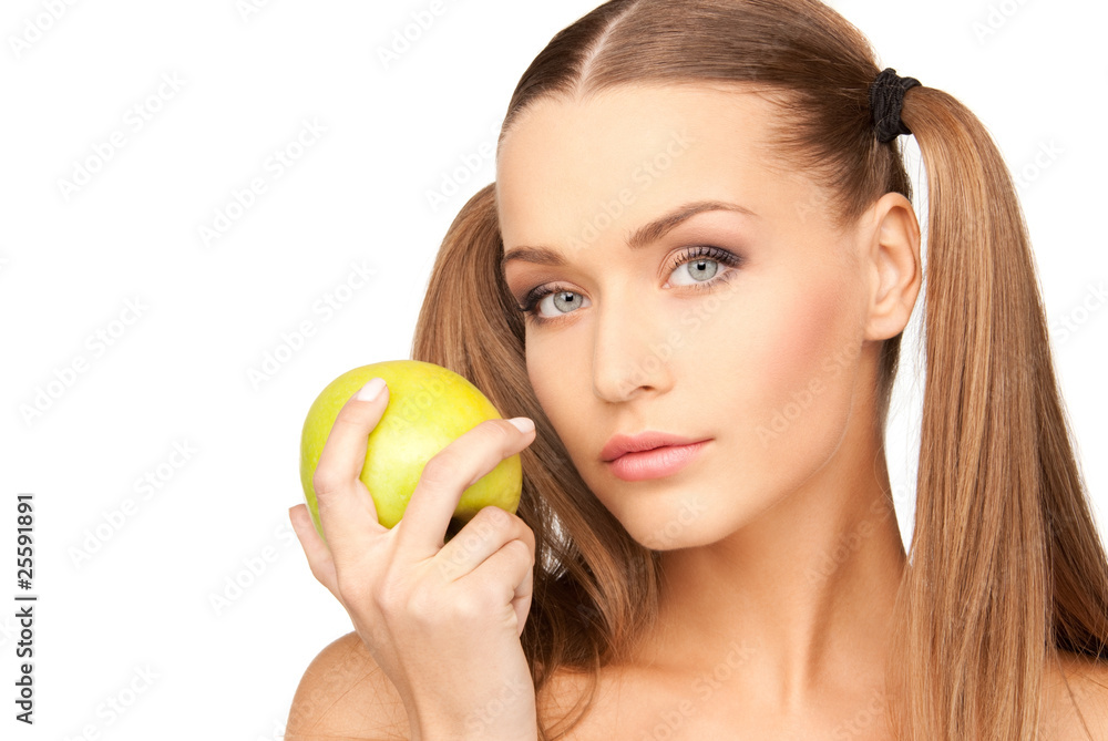 young beautiful woman with green apple young beautiful woman with green apple