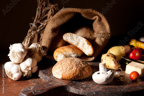 Still life with bread, vegetable, cheese and mushroom