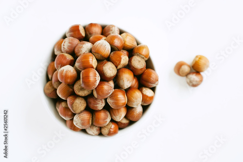 a bowl full of hazelnuts