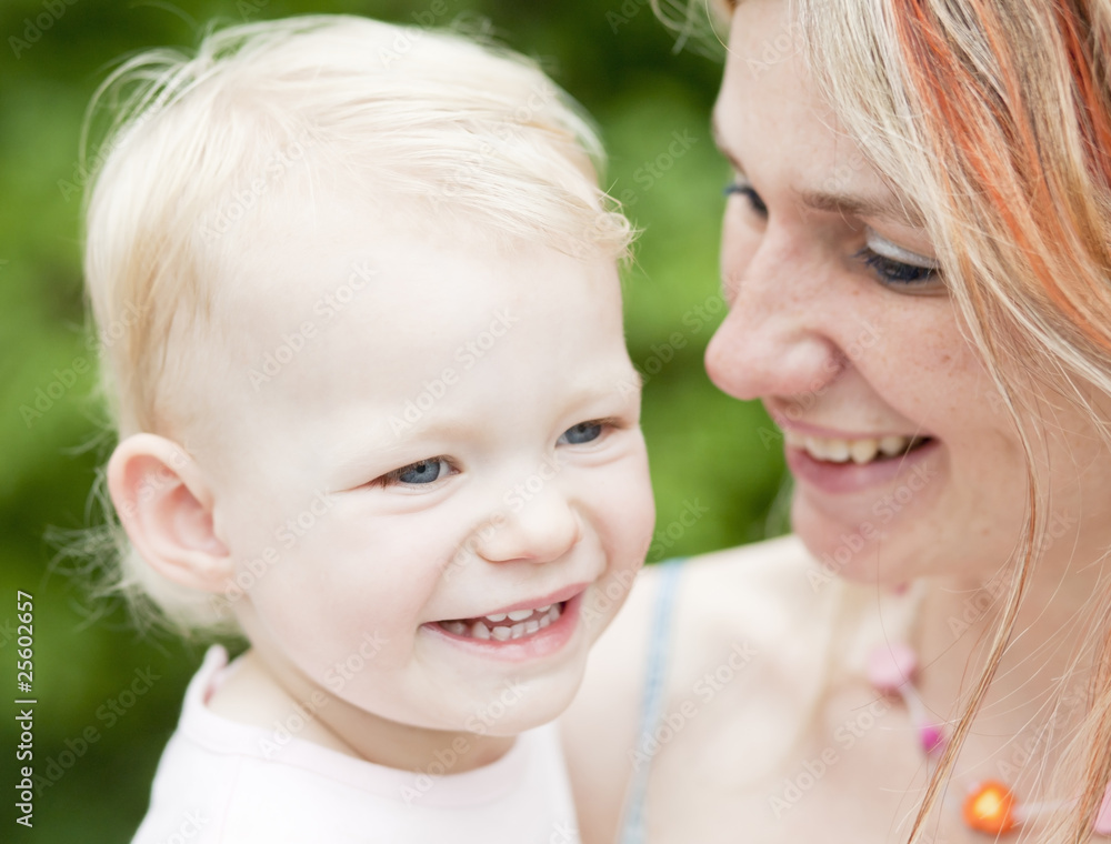 portrait of mother with her little daughter