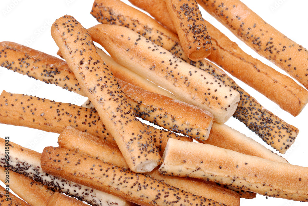 Salted breadsticks with poppy seed isolated on white Salted breadsticks with poppy seed isolated on white