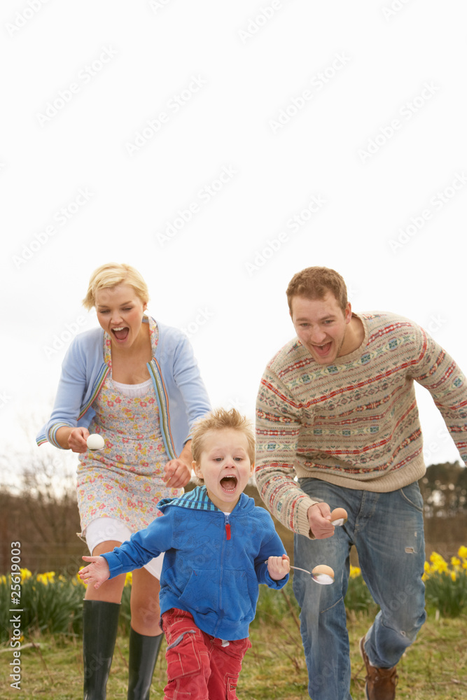 Fototapeta premium Family Having Egg And Spoon Race