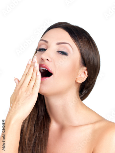 Portrait of beautiful woman, she is yawning