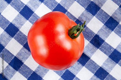 red tomato on table