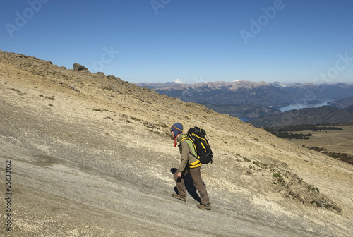 walking in a deserted area (volcàn batea mahuida - argentina) photo