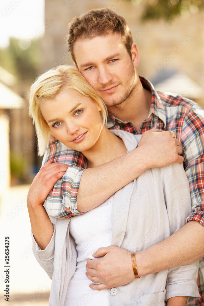 Fototapeta premium Portrait Of Romantic Young Couple Embracing