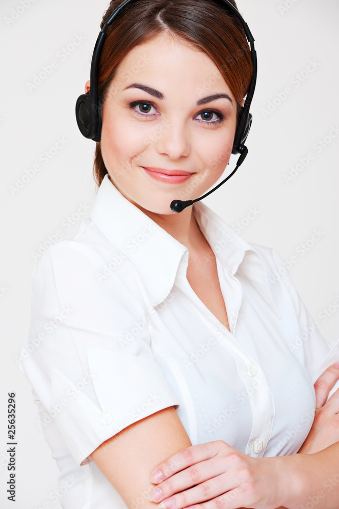 friendly telephone operator over grey background friendly telephone operator over grey background