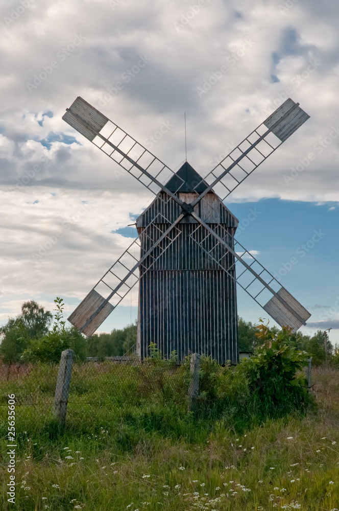 Old wooden wind mill on the countryside in Poland Old wooden wind mill on the countryside in Poland