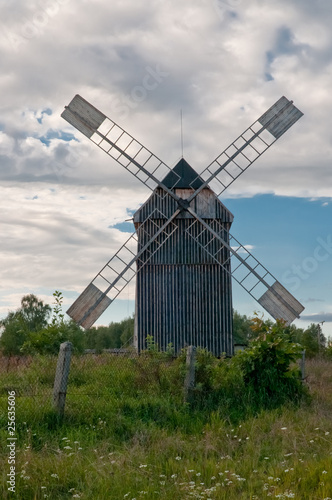 Old wooden wind mill on the countryside in Poland