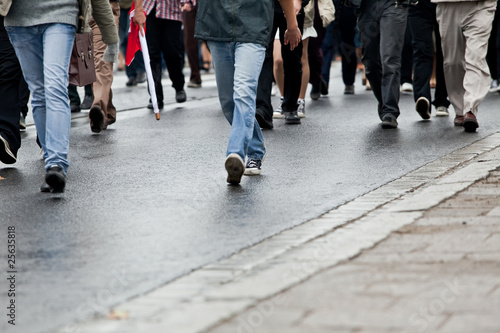 Crowd walking - group of people walking together (motion blur)