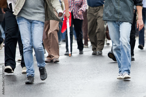 Crowd walking - group of people walking together (motion blur)