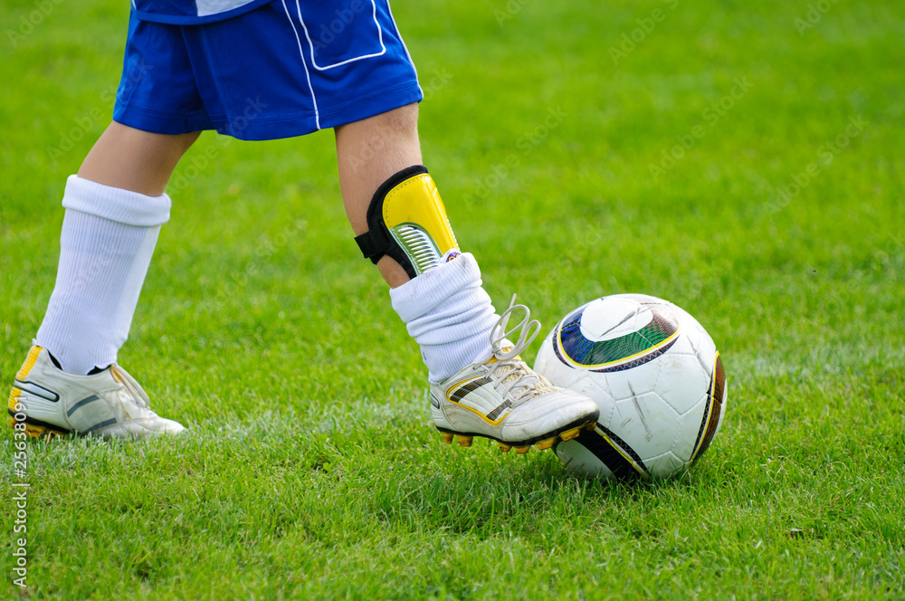 Naklejka premium Playing soccer