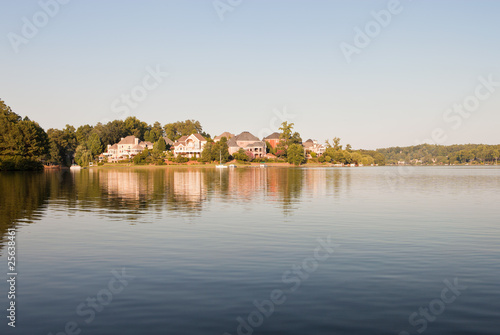 Luxury houses on a lake © Nickolay Khoroshkov