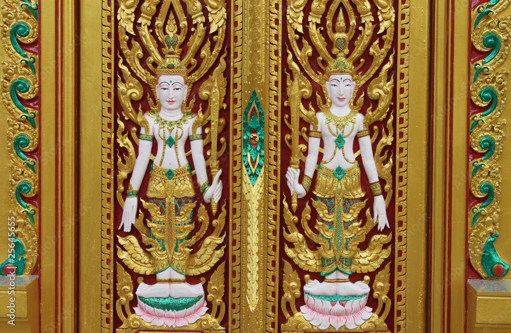 Thai art carving on door of temple, Wat Ra Han, Buriram