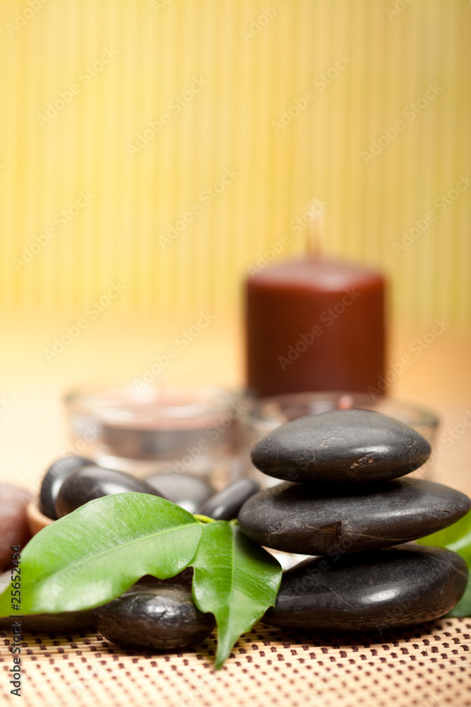 Black spa stones and candles Black spa stones and candles