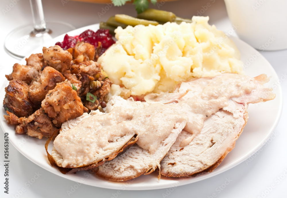 Sliced turkey breast with mashed potatoes and stuffing Sliced turkey breast with mashed potatoes and stuffing