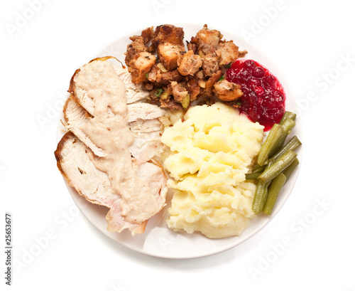 Sliced turkey breast with mashed potatoes and stuffing