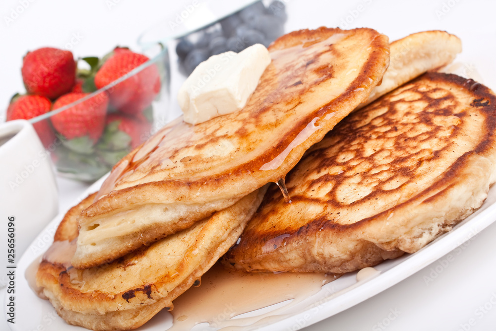 stack of pancakes with syrup and fruit stack of pancakes with syrup and fruit