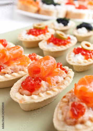 large group of canape with salmon and caviar