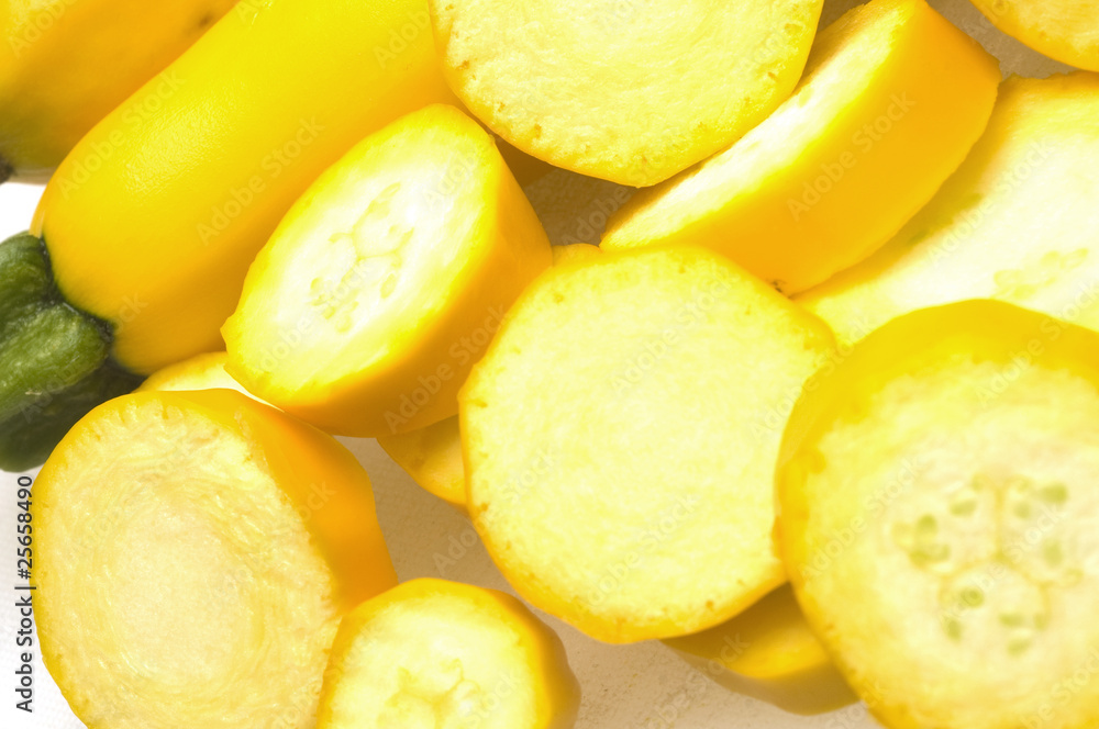 two yellow zucchini squash with slices two yellow zucchini squash with slices