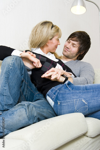 Couple relaxing at home