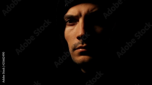 Man coming out of the dark