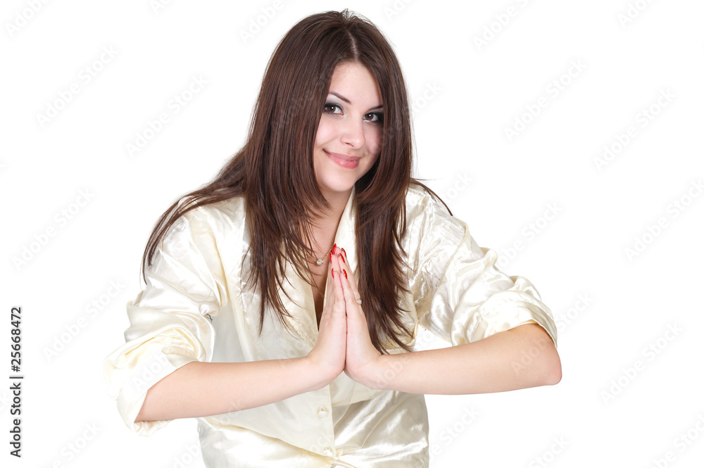 girl meditating on a white background in pyjamas girl meditating on a white background in pyjamas