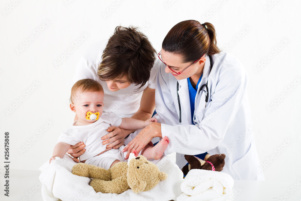 mother and child in paediatrician's office mother and child in paediatrician's office