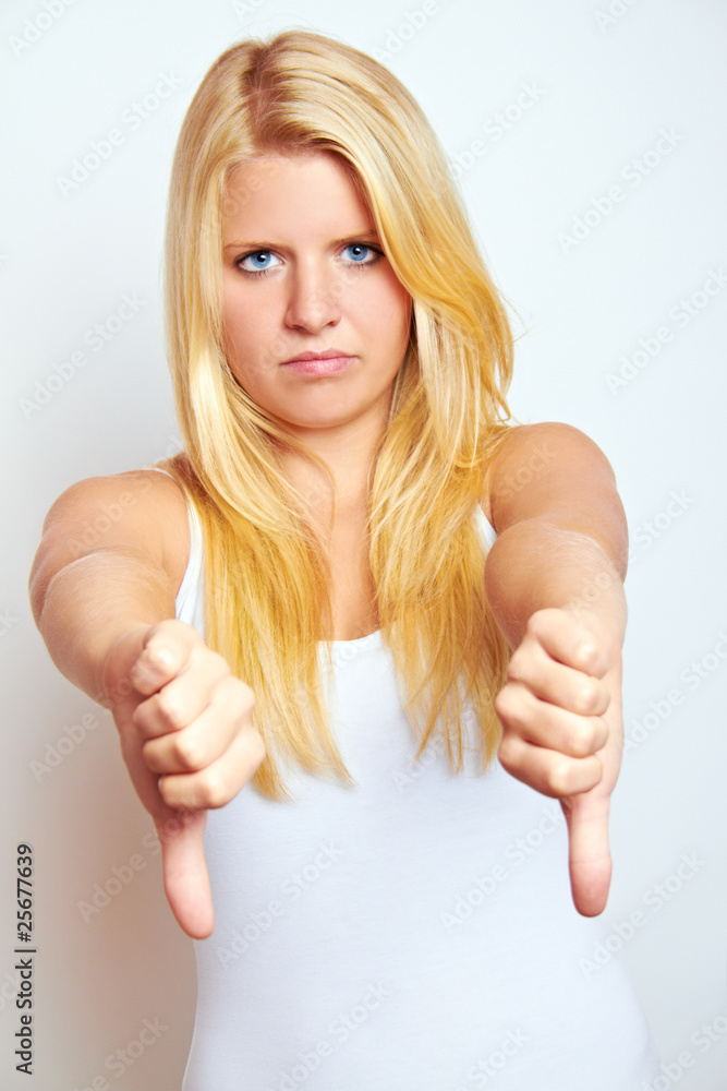 erfolglose traurige frau mit daumen nach unten Stock Photo Adobe Stock