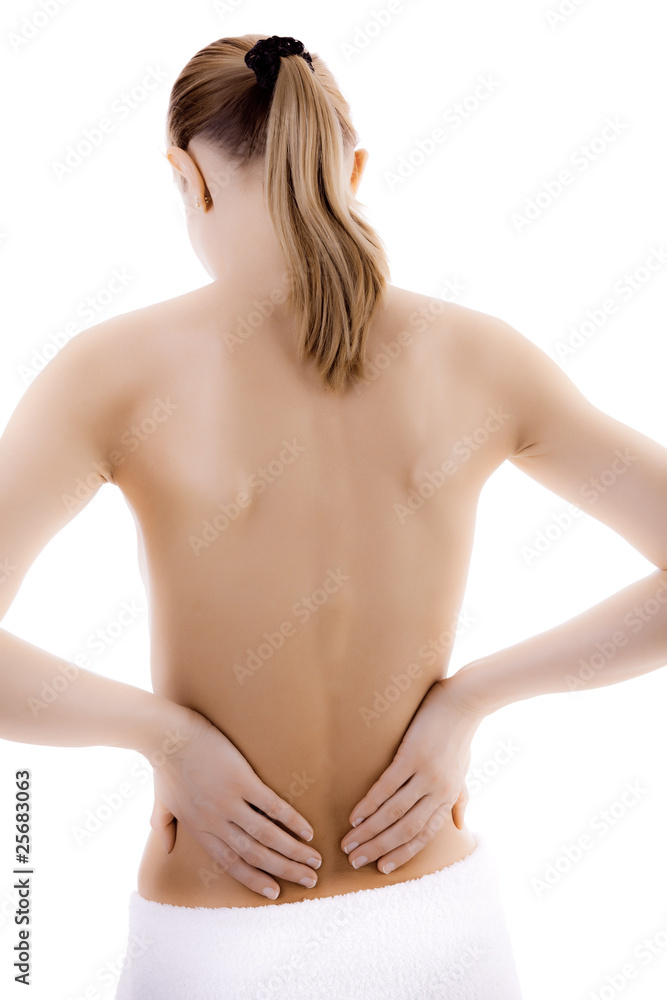 Woman massaging pain back isolated on white Woman massaging pain back isolated on white