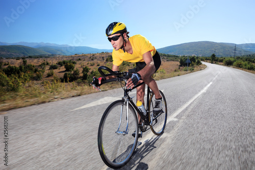 Fototapeta Naklejka Na Ścianę i Meble -  Cyclist riding a bike