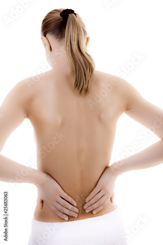 Woman massaging pain back isolated on white