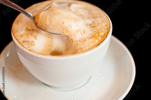 cappuccino isolated on black