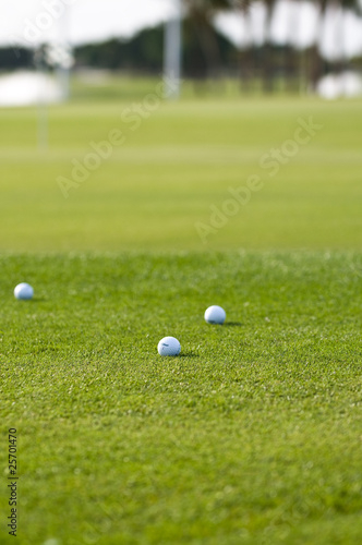 Golf balls on golf course
